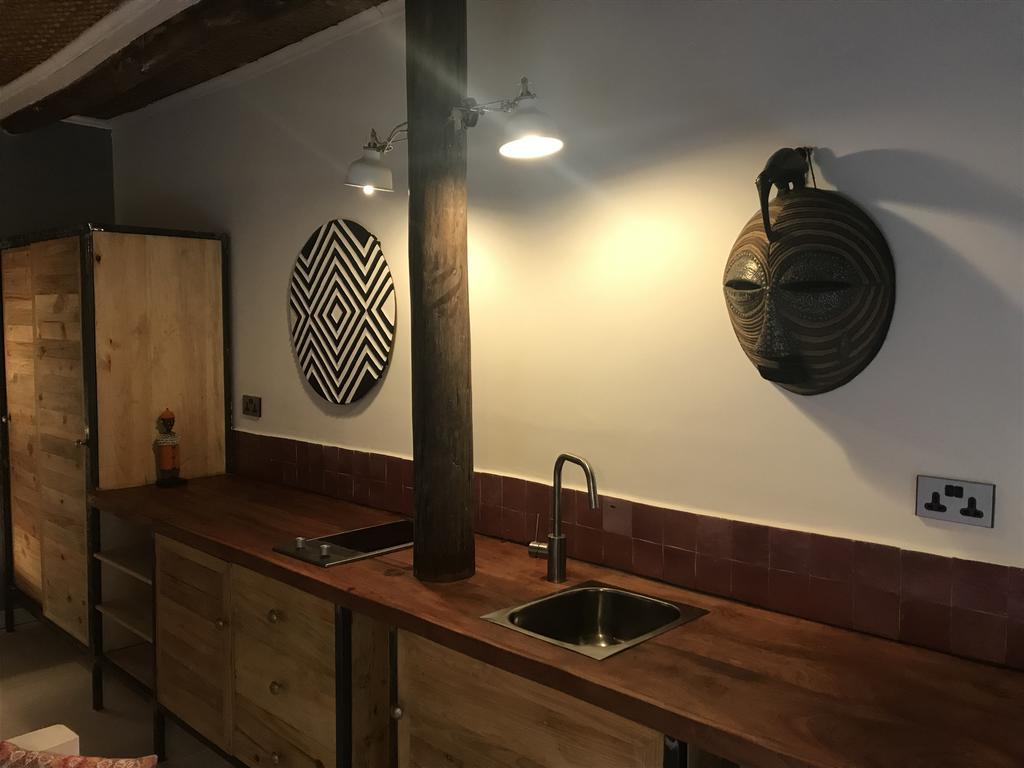 Pili Pili Boutique Hotel Кігалі Номер фото